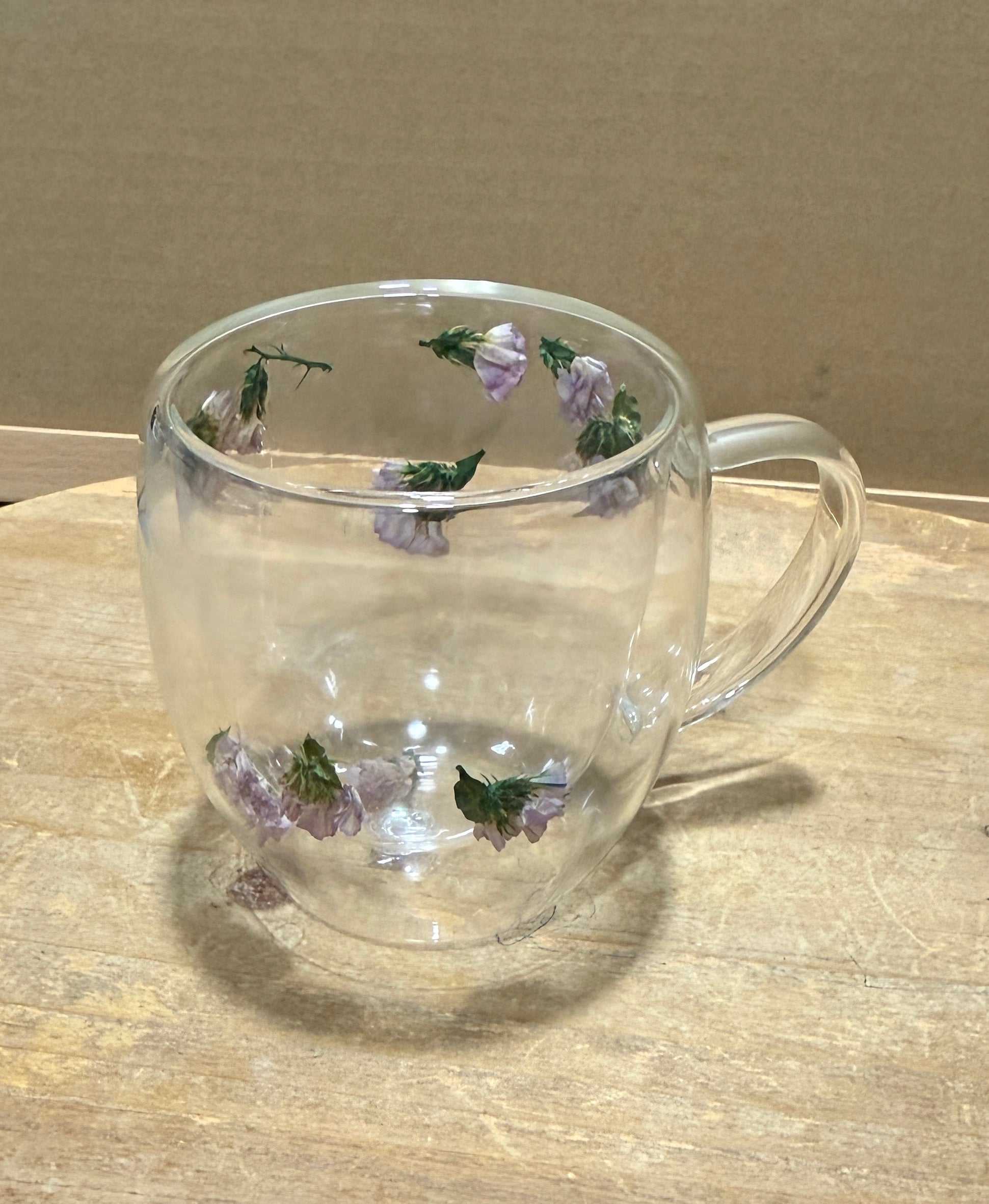 Double layer glass mug with dry flowers