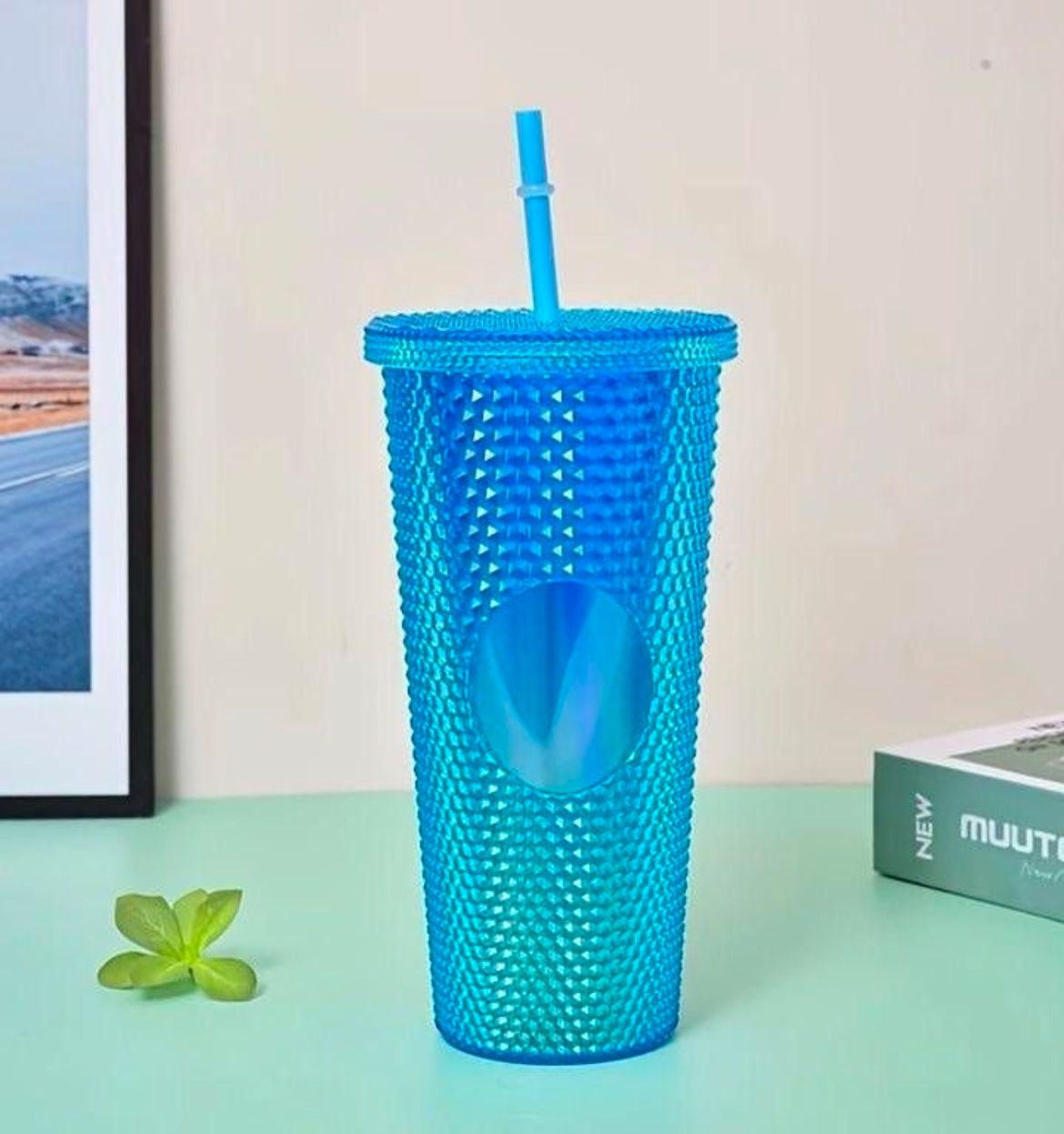 Long plastic mug with straw