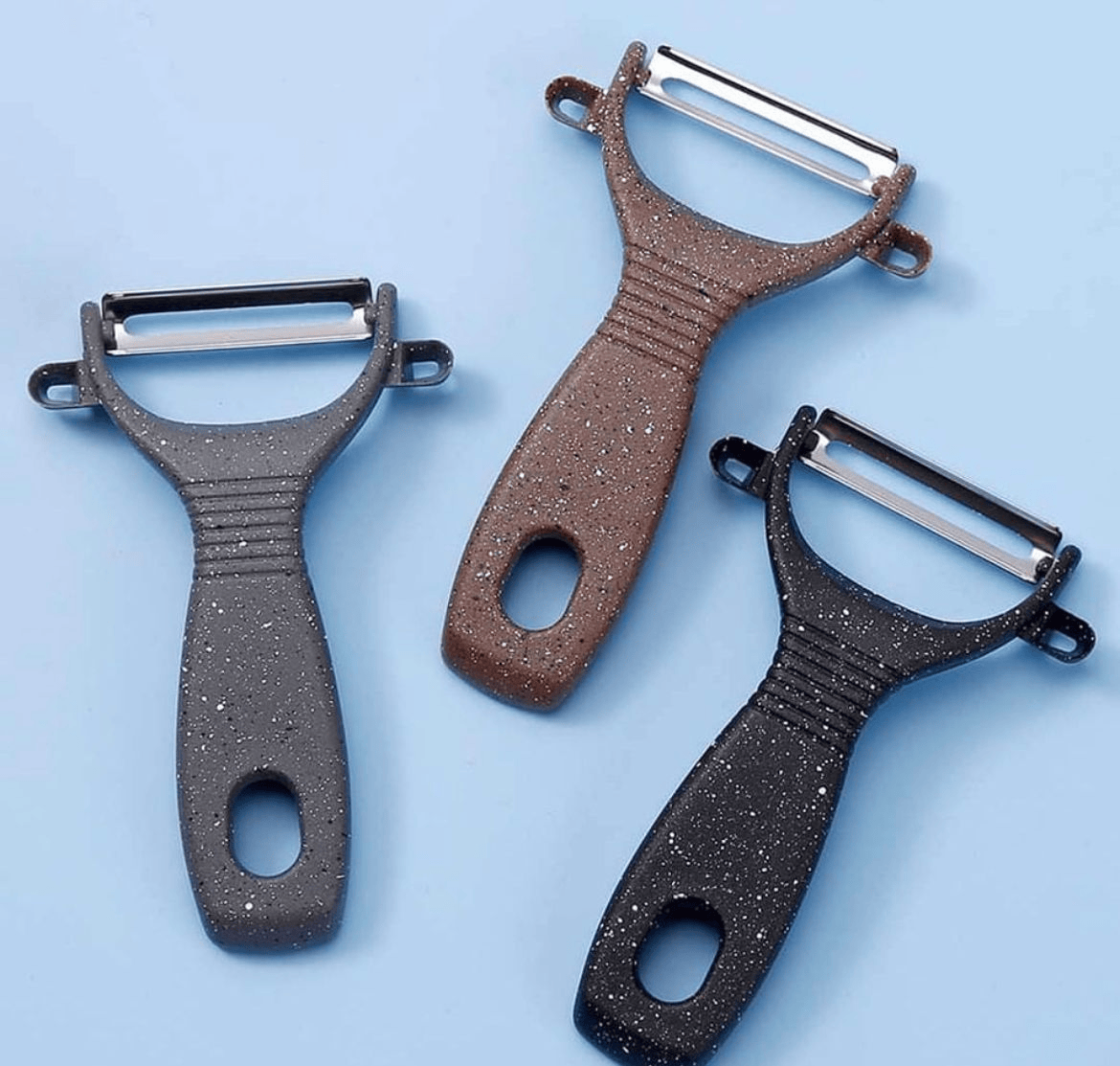 Manual plastic peeler with stainless blade
