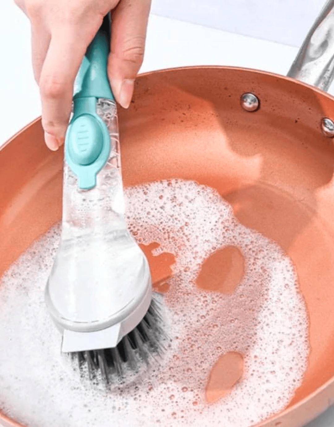 Soap dispensing dish scrubbing brush