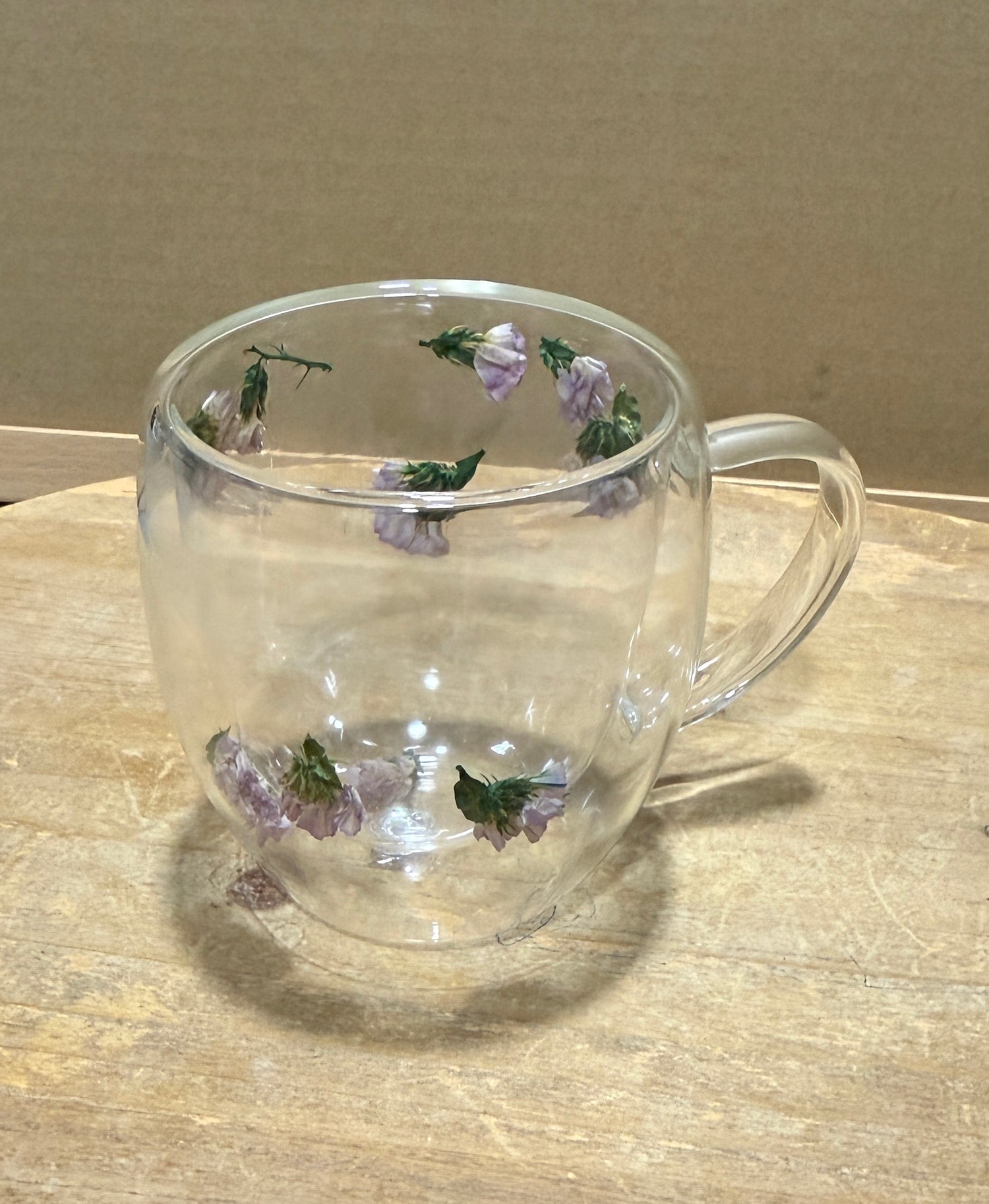 Double layer glass mug with dry flowers