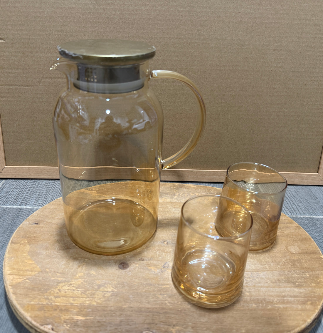 Round heat resistant glass pitcher with stainless lid and 6 glasses