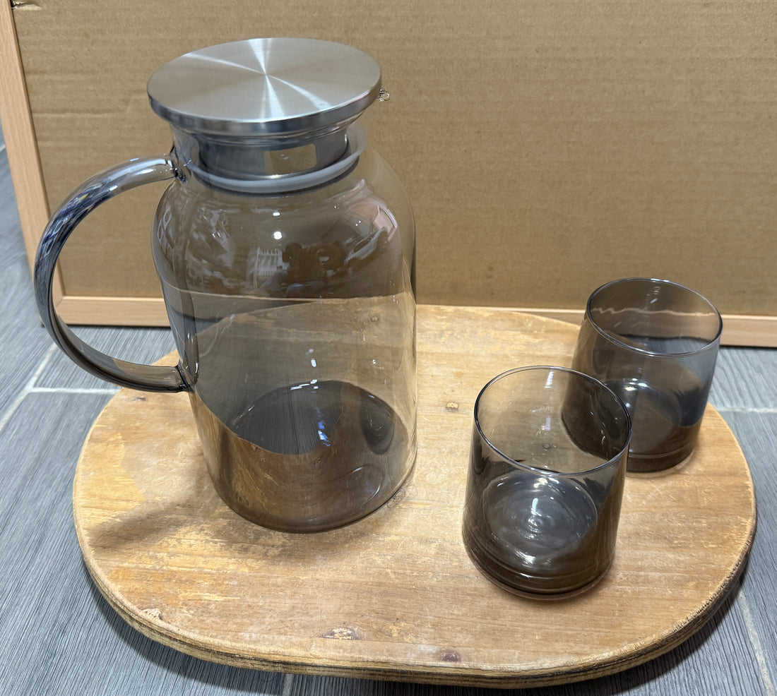 Round heat resistant glass pitcher with stainless lid and 6 glasses