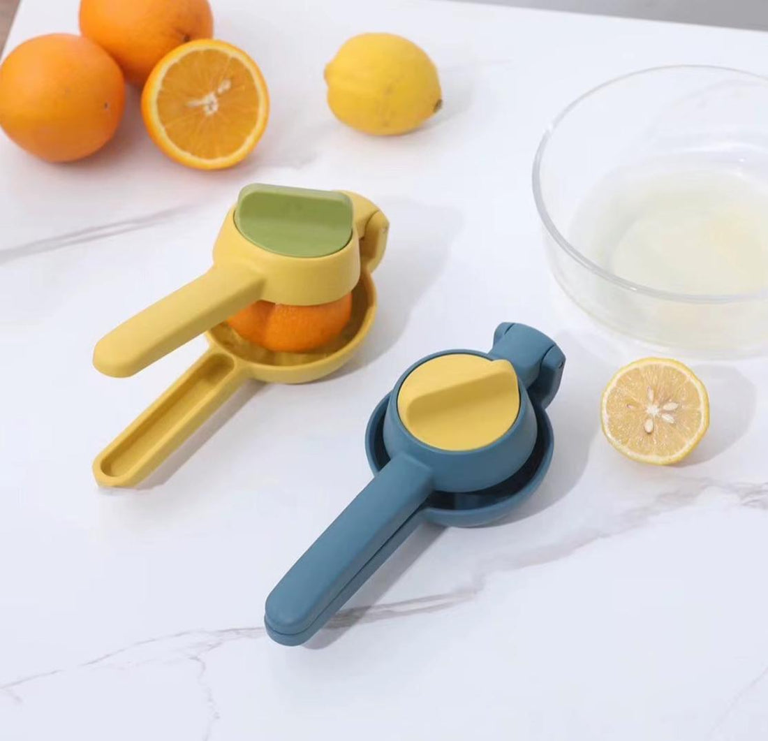Manual press lemon squeezer with twist button