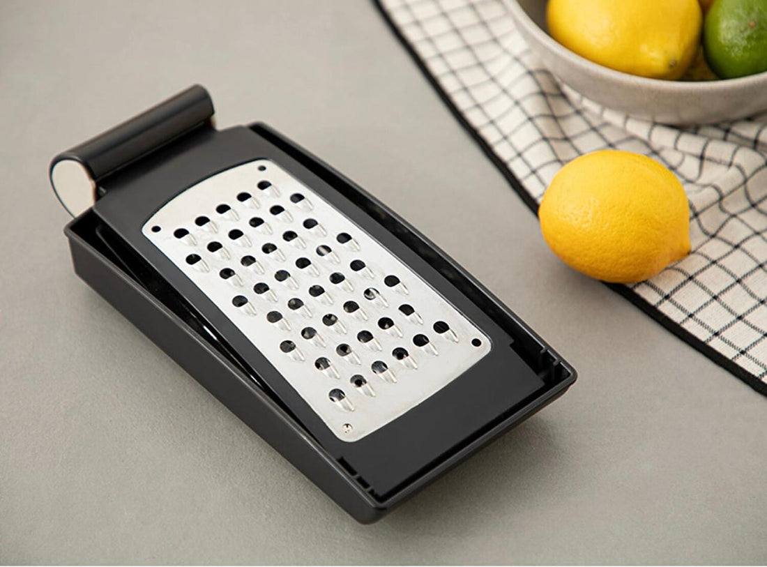 Foldable stainless steel grater with tray