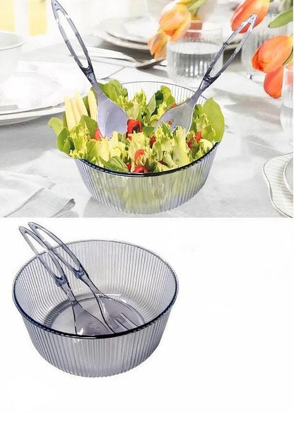 Plastic salad mixing bowl with fork and spoon