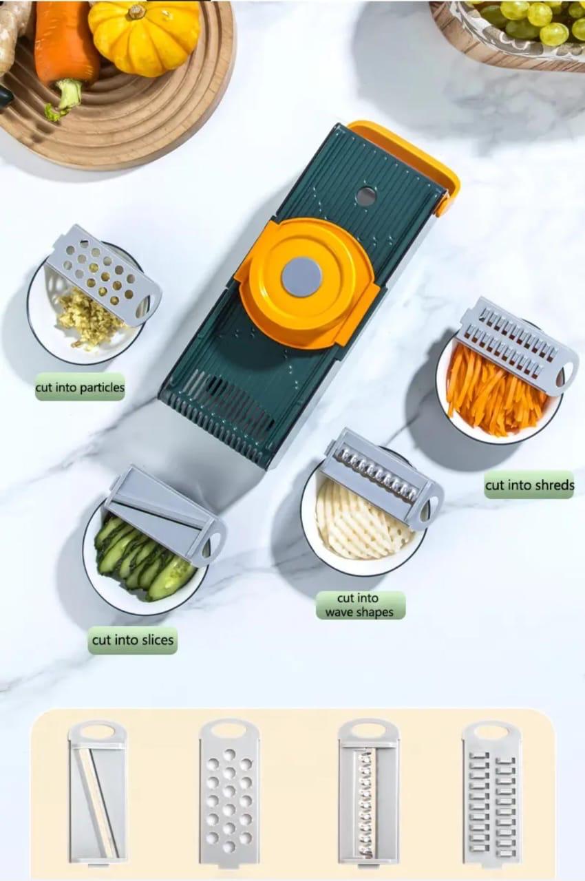 Multifunctional fruit and vegetable slicer with hand guard