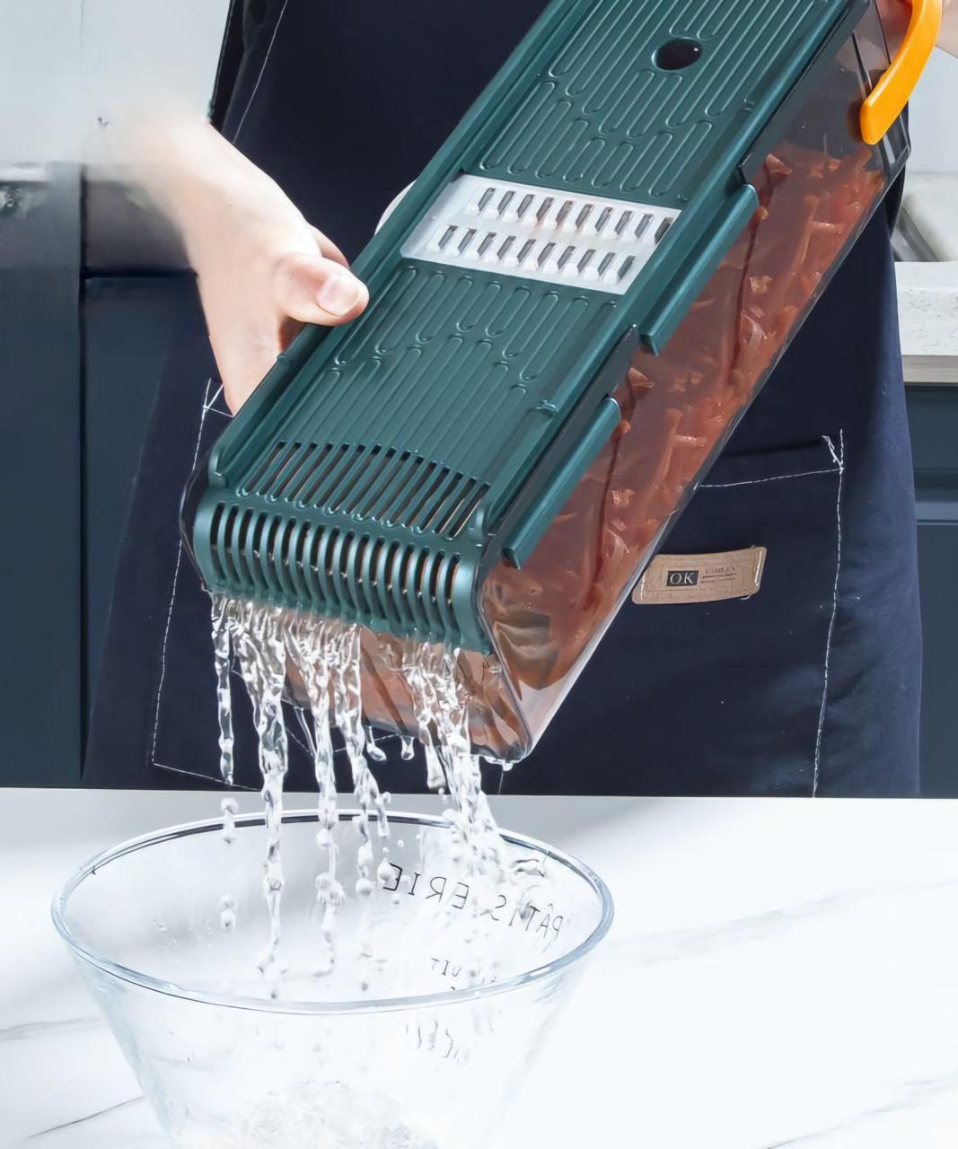 Multifunctional fruit and vegetable slicer with hand guard